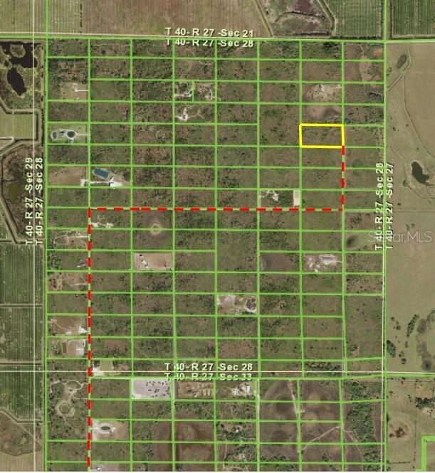 This is a map showing a highlighted rectangular land parcel with a red dashed access path — 50760 BERMONT ROAD, PUNTA GORDA, FL