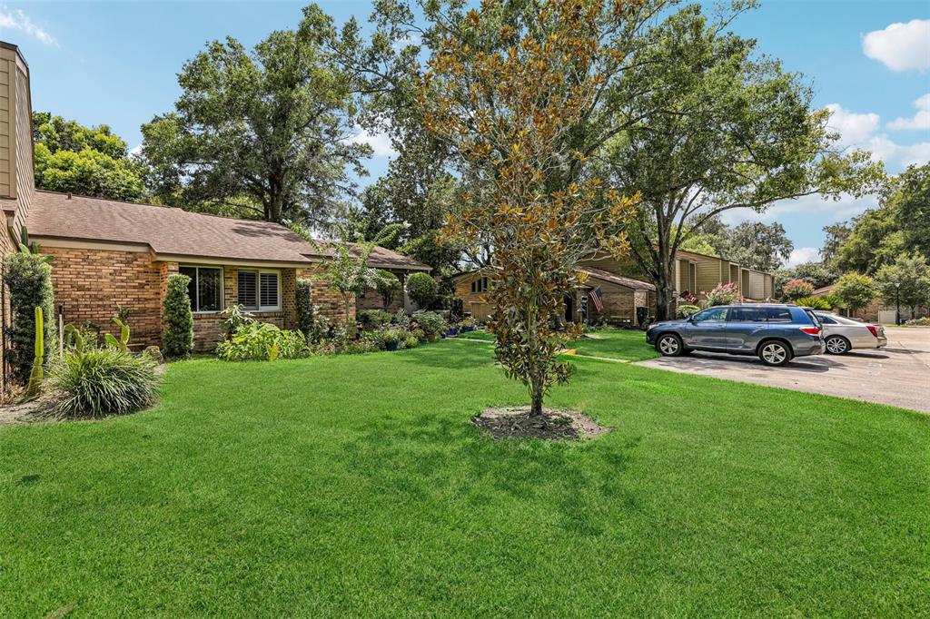 A single-story brick house with a large front lawn and mature trees — 460 OAK HAVEN DRIVE, ALTAMONTE SPRINGS, FL