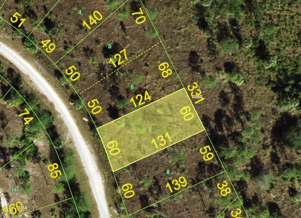 This is a map showing a highlighted rectangular land parcel labeled with the number 7 — 13588 CAROUSEL DRIVE, PUNTA GORDA, FL