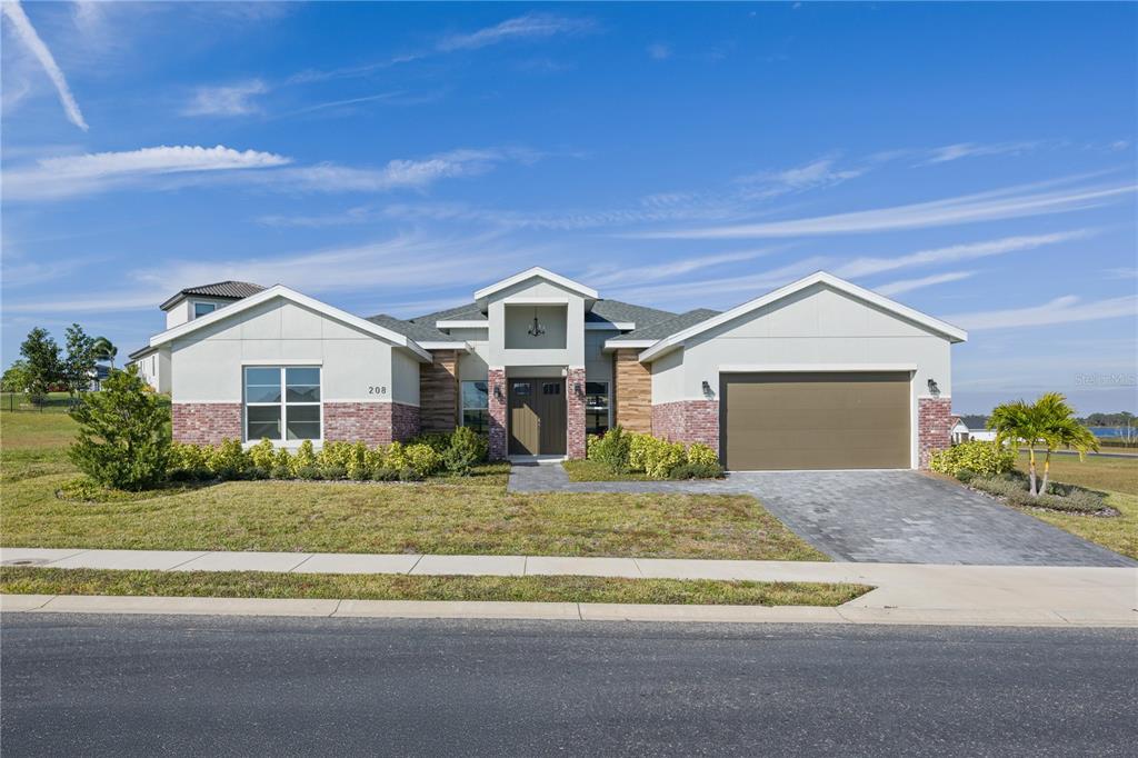 208 SNOWY ORCHID WAY