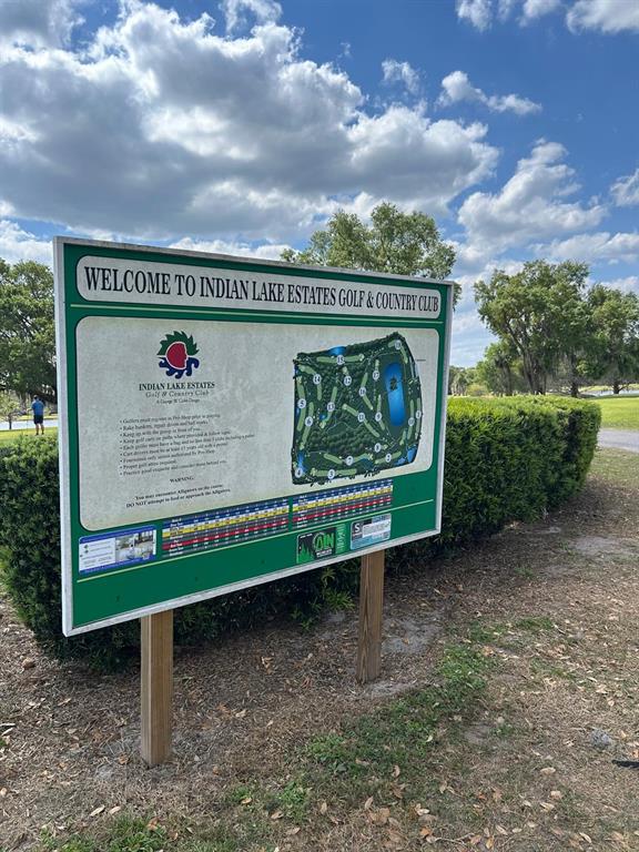 A map of the Indian Lake Estates Golf & Country Club stands on a wooden post — 1020 ALTHEA DRIVE, INDIAN LAKE ESTATES, FL