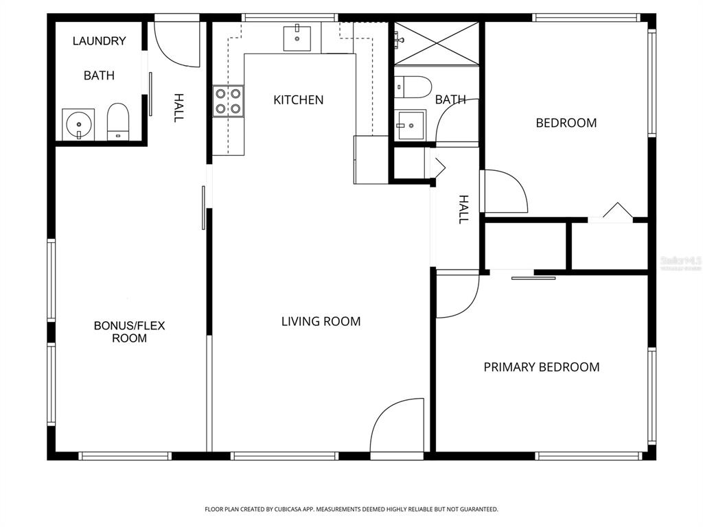 This is a floor plan showing a two-bedroom, two-bathroom home with a living room and kitchen — 675 182ND AVENUE E, REDINGTON SHORES, FL