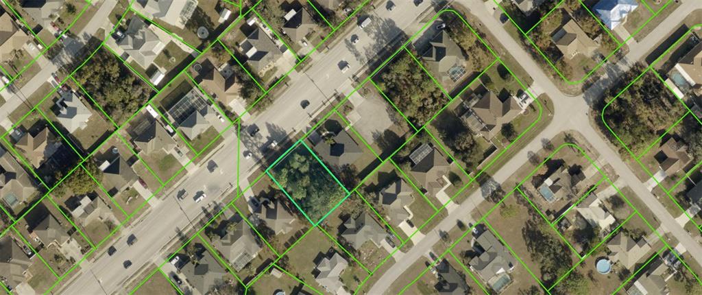 This is an aerial map view of a residential neighborhood with outlined property lines — 14144 SPRING HILL DRIVE, SPRING HILL, FL