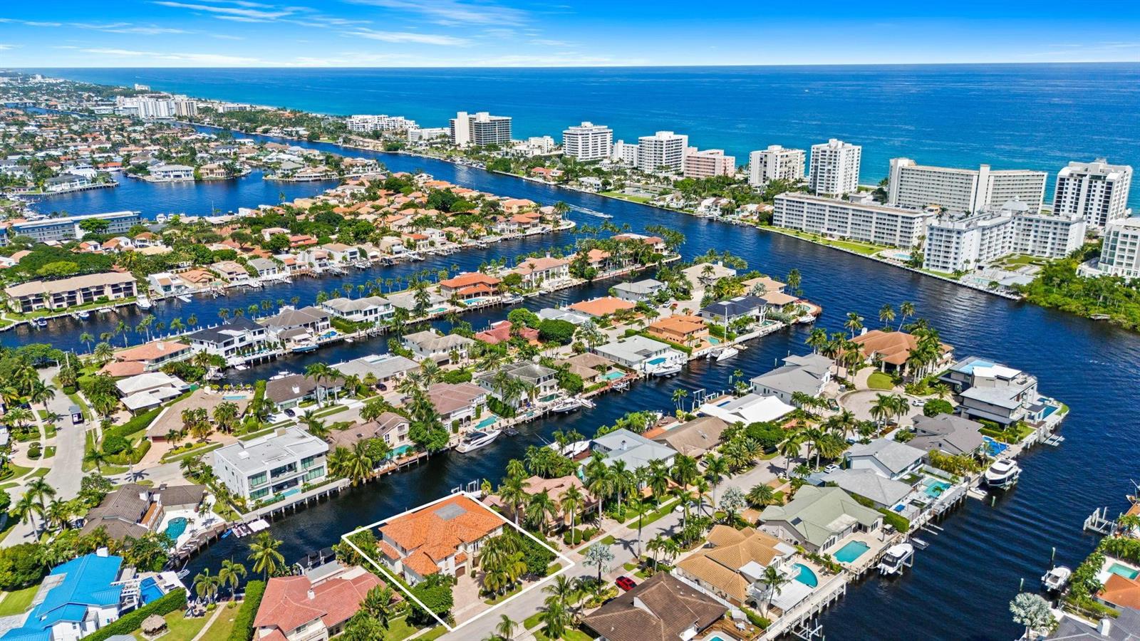 An aerial view shows a waterfront residential neighborhood with a highlighted house in the foreground — 861 Nafa Drive, Boca Raton FL 33487, BOCA RATON, FL