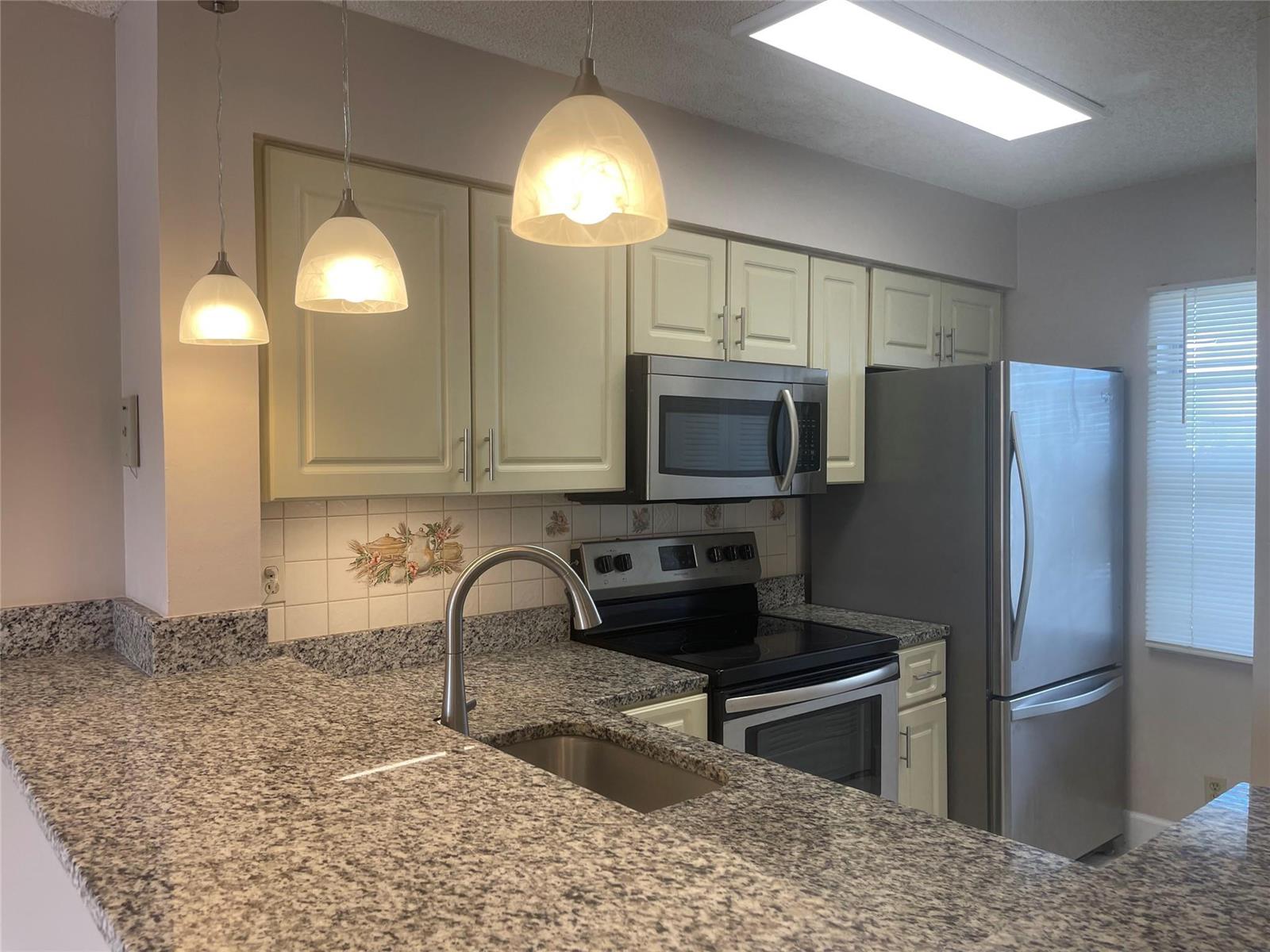 Track lighting over break-front! — POMPANO BEACH, FL