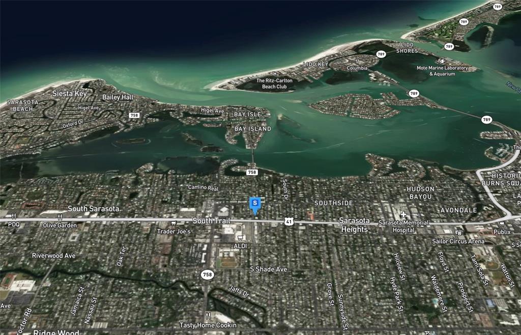 This is an aerial map view of the Sarasota, Florida coastline and surrounding neighborhoods — 1871 SIESTA DRIVE, SARASOTA, FL