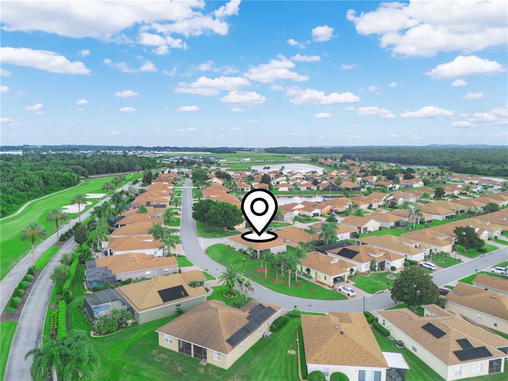 An aerial view shows a suburban neighborhood with single-family homes and a marked location pin — 4251 DORNOCH DRIVE, LAKE WALES, FL