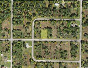 This is an aerial map view showing a highlighted vacant lot within a residential subdivision — 29438 IXORA ROAD, PUNTA GORDA, FL