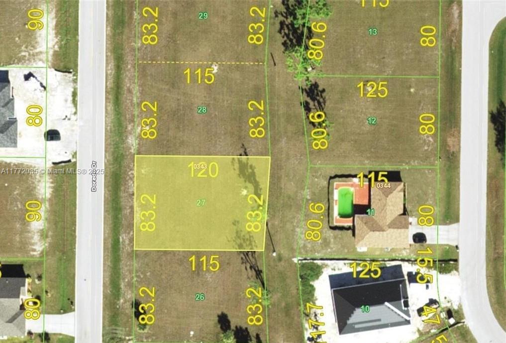 This is a satellite map showing property lot lines and dimensions for a residential area — 25482 Doredo Dr, Punta Gorda FL 33955, PUNTA GORDA, FL
