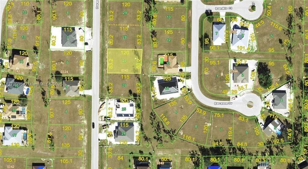 This is a satellite map showing residential lots and houses in a suburban neighborhood — 25482 Doredo Dr, Punta Gorda FL 33955, PUNTA GORDA, FL