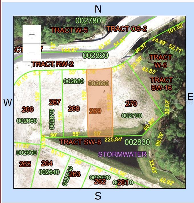 This is a map showing a highlighted residential lot adjacent to a stormwater retention pond — 1233 BUTTERFLY ORCHID ROAD, DAVENPORT, FL