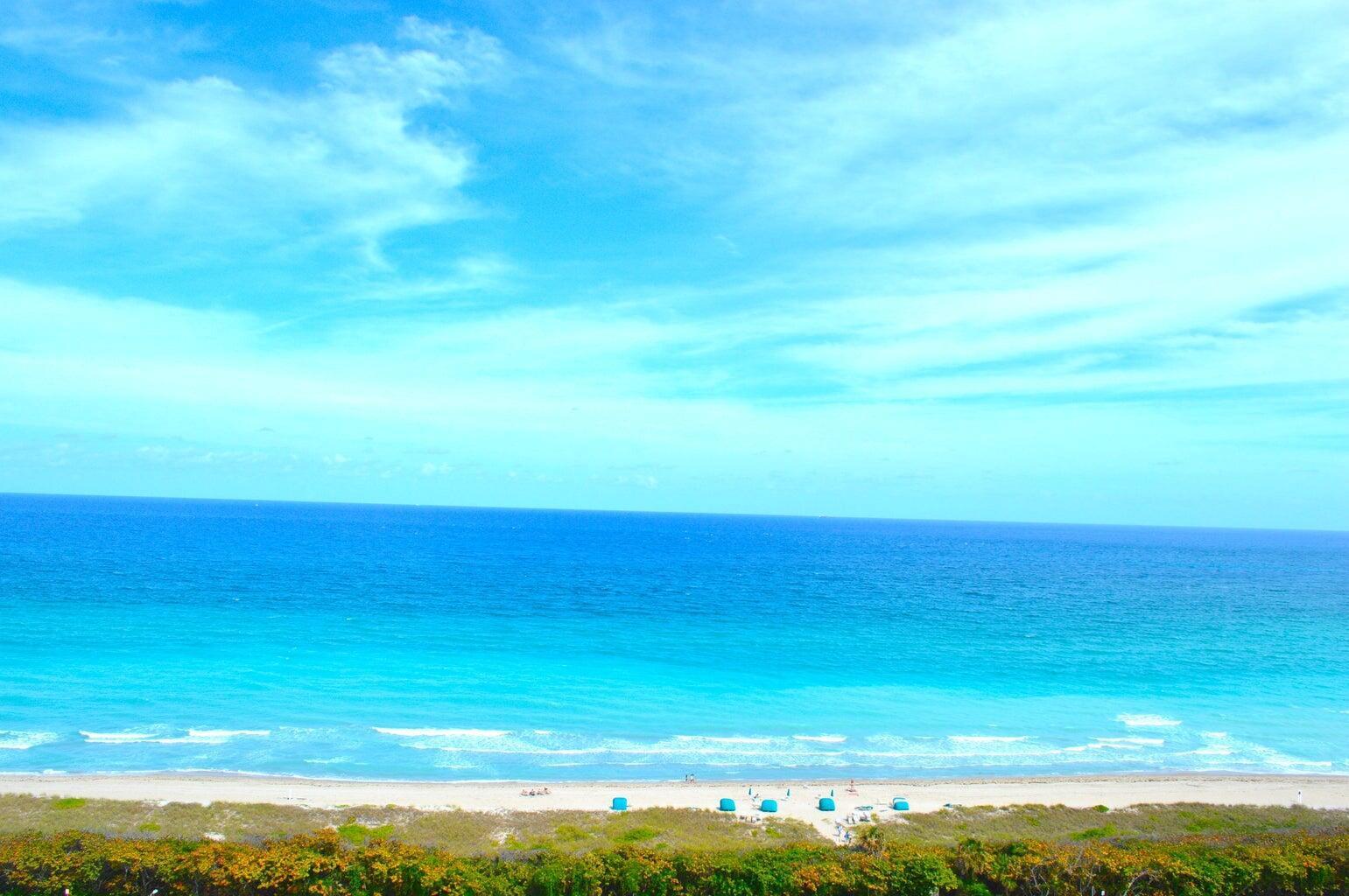 An elevated view of a sandy beach with turquoise ocean water and a blue sky — 4201 N Ocean Boulevard # 1405, Boca Raton FL 33431, BOCA RATON, FL