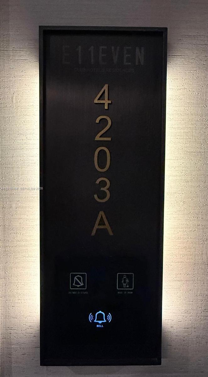 A vertical sign for room 4203A at E11EVEN Hotel & Residences with backlit edges — 20 NE 11th # 4203A, Miami FL 33132, MIAMI, FL
