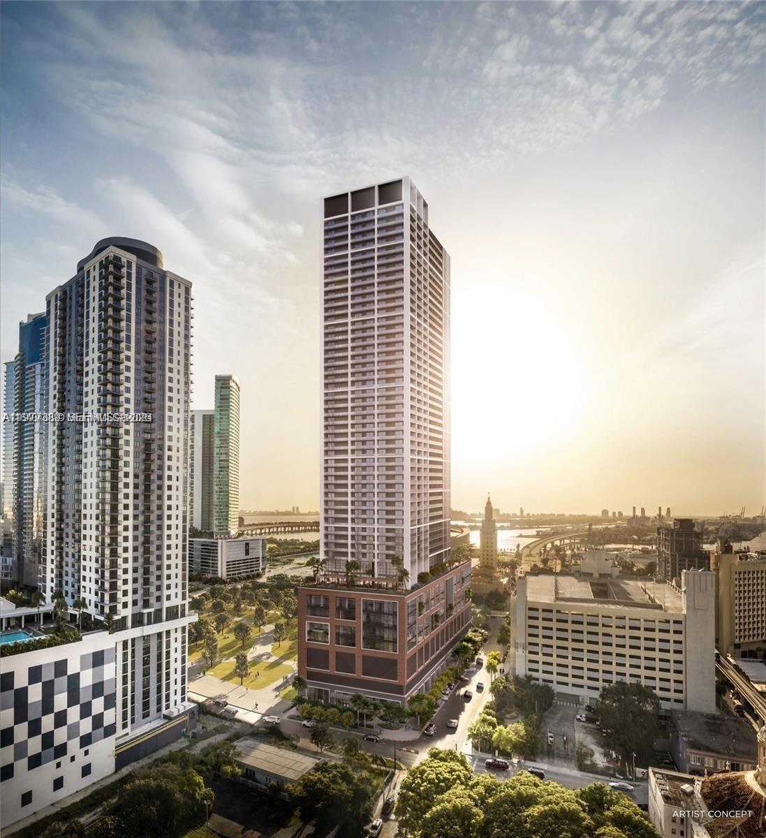 This is an architectural rendering of a tall residential skyscraper overlooking a city park — 159 NE 6th St # 3713, Miami FL 33132, MIAMI, FL