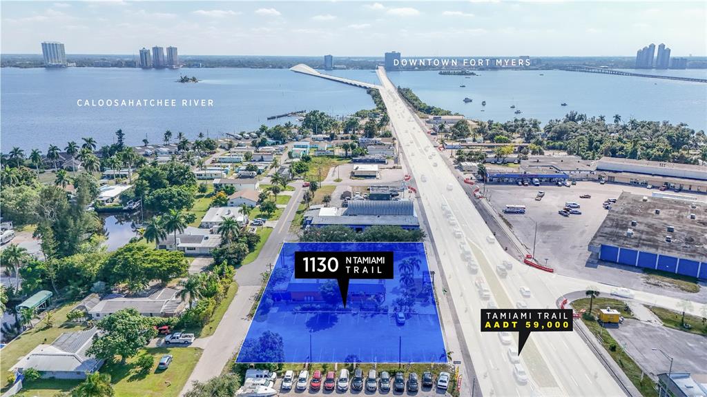 An aerial view shows a commercial property highlighted in blue along a busy highway — 1130 N TAMIAMI TRAIL, NORTH FORT MYERS, FL