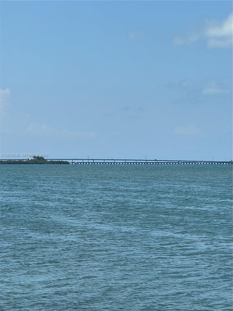 A long bridge spans across a body of water under a clear blue sky — Lot 27 Dorn Road, Torch Key FL 33042, TORCH KEY, FL