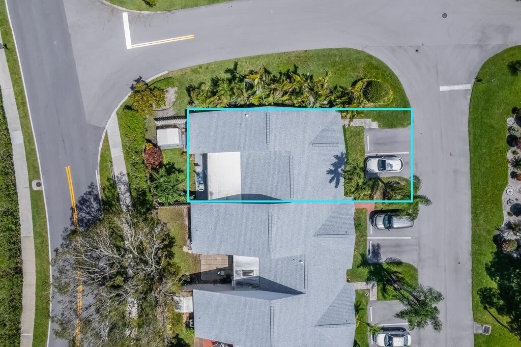 An aerial view shows a residential building with a highlighted roof section and parking spaces — 1260 NW 24th Avenue, Delray Beach FL 33445, DELRAY BEACH, FL