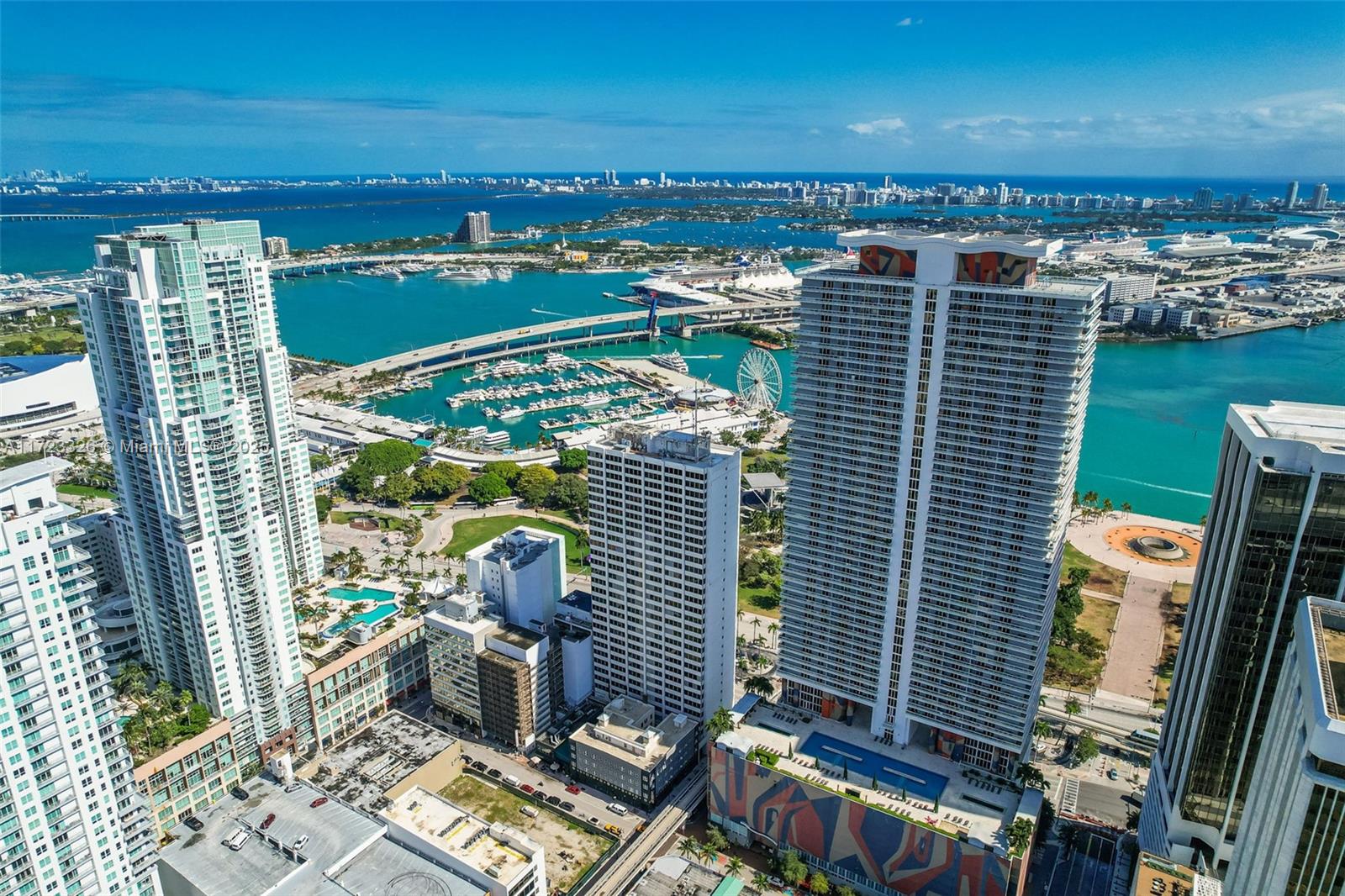An aerial view of high-rise apartment buildings in downtown Miami near the waterfront and marina — 50 Biscayne Blvd # 4208, Miami FL 33132, MIAMI, FL