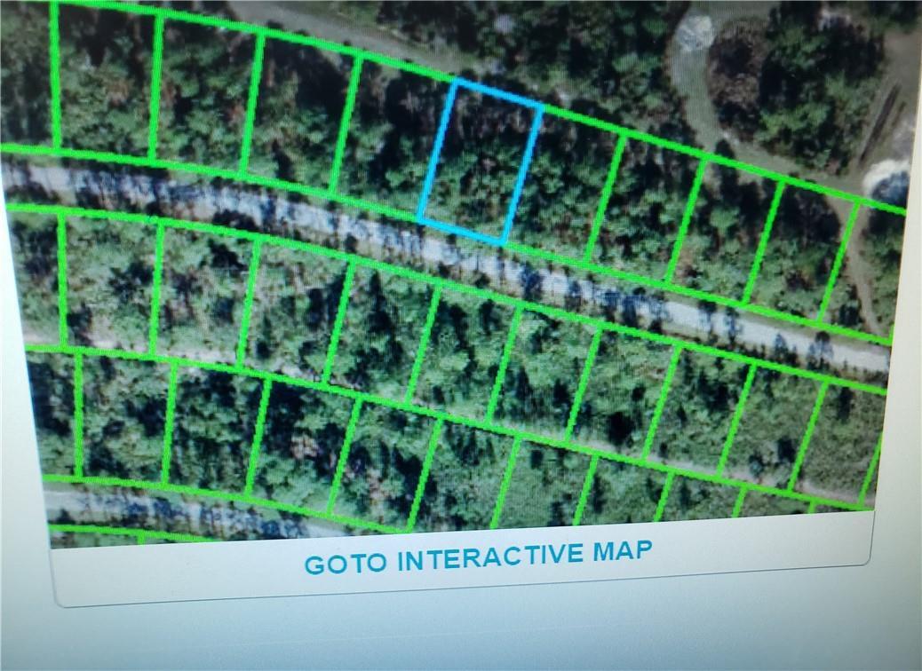 An aerial map shows a grid of land parcels with one lot highlighted in blue — 8644 Tunis Street, FL 33872, FL