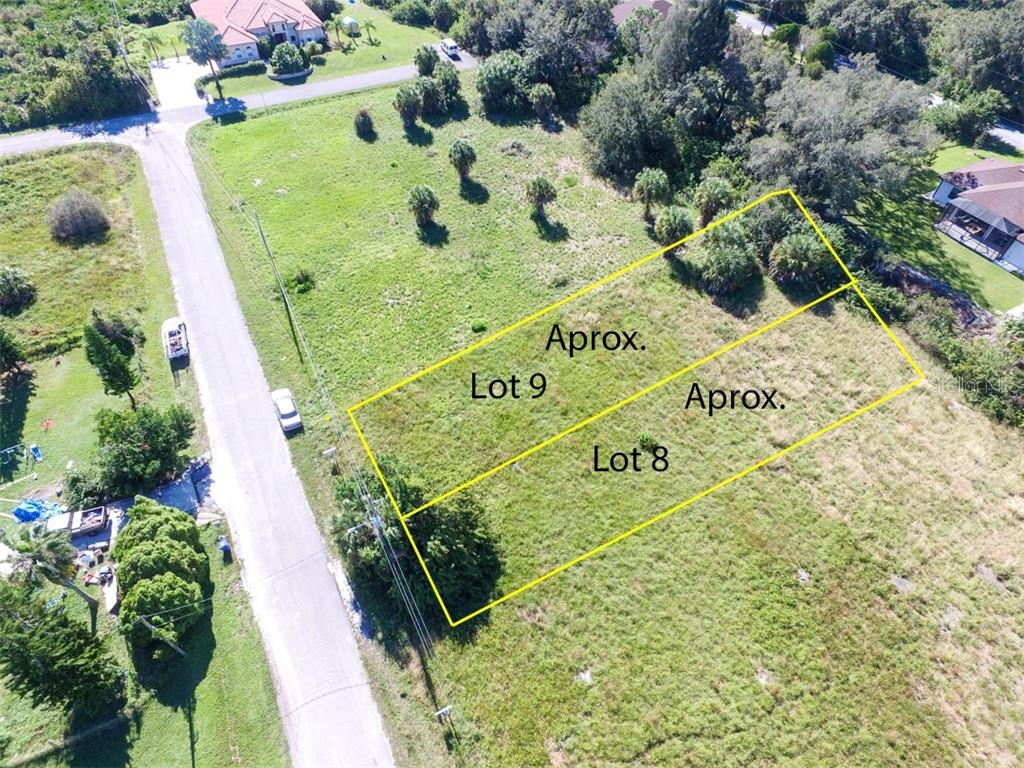 An aerial view shows two adjacent vacant lots outlined in yellow along a paved road — Lot 8 VENTURA STREET, NORTH PORT, FL