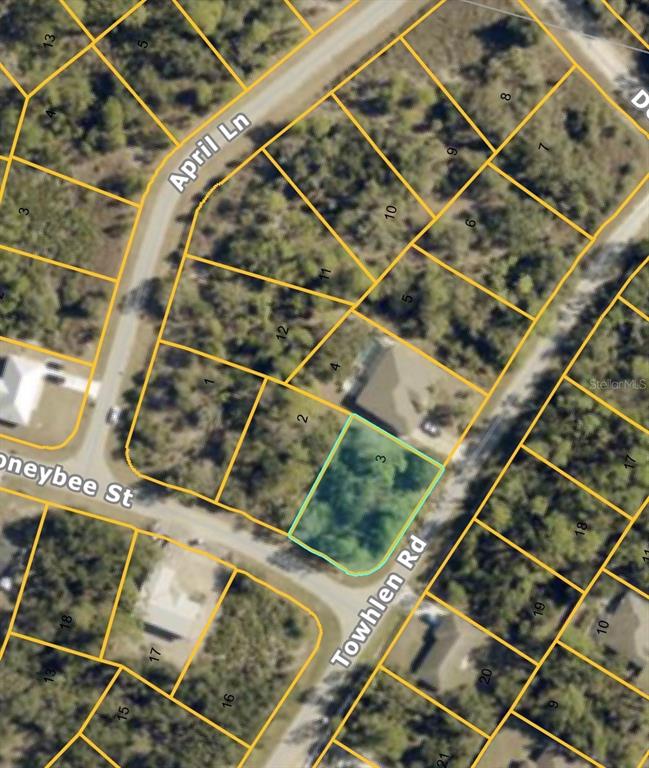 This is an aerial map showing a highlighted vacant lot at a street intersection — Lot #3 TOWHLEN ROAD, NORTH PORT, FL