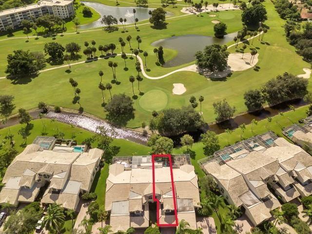 An aerial view shows a multi-unit residential building with a red outline highlighting one section — 676 W Palm Aire Drive, Pompano Beach FL 33069, POMPANO BEACH, FL