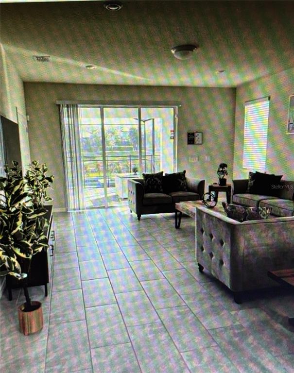 7239 OAKMOSS LOOP, DAVENPORT, FL — photo 3 of 27