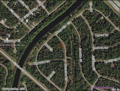 This is an aerial map showing a vacant lot outlined in red within a residential neighborhood — 0 Hamerton, North Port FL 34288, NORTH PORT, FL