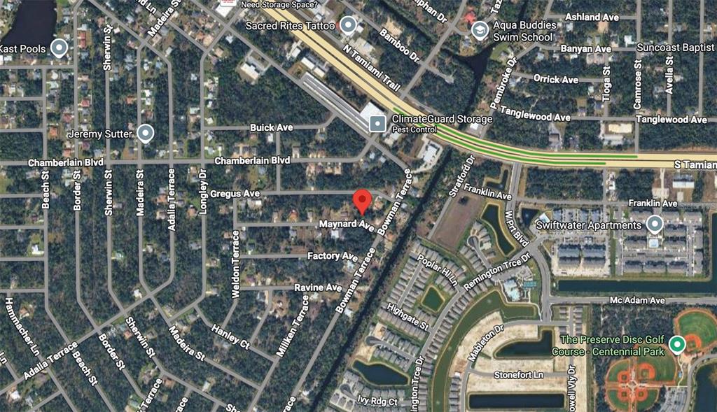 This is an aerial map showing residential streets, a park, and commercial areas — 15578 MAYNARD AVENUE, PORT CHARLOTTE, FL