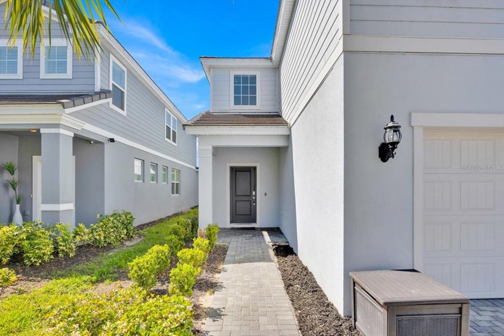 7387 OAKMOSS LOOP, DAVENPORT, FL — photo 2 of 30