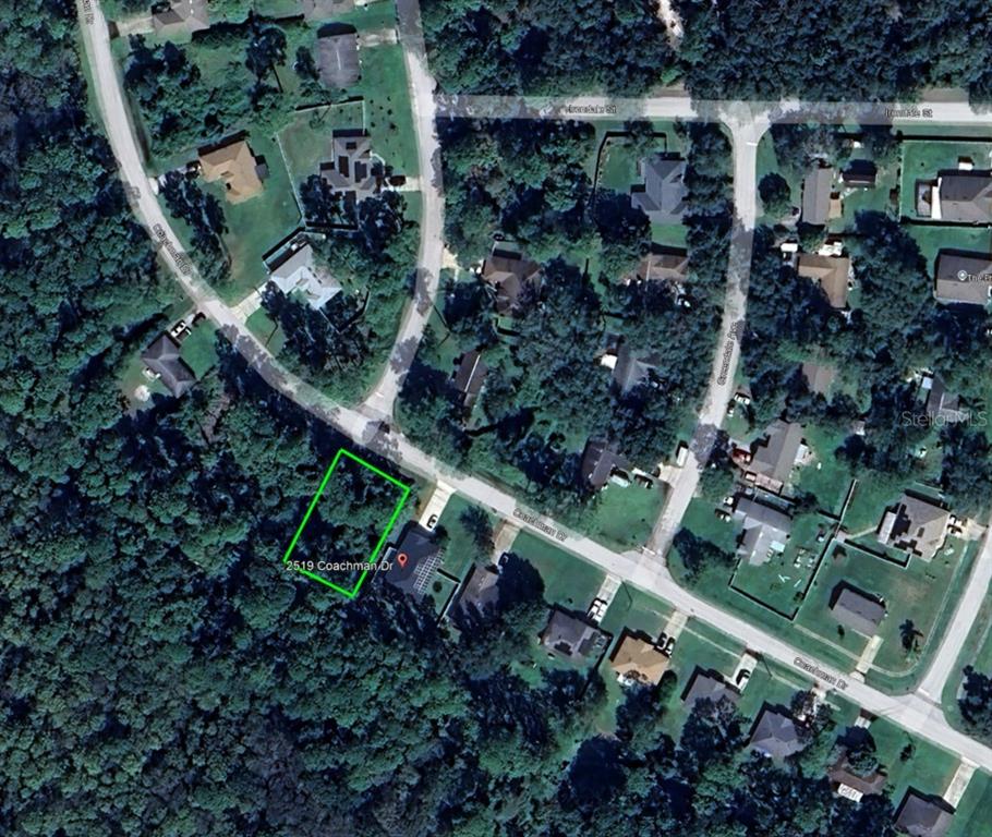 An aerial map view shows a vacant, rectangular lot outlined in green along a residential street — 2519 COACHMAN DRIVE, DELTONA, FL