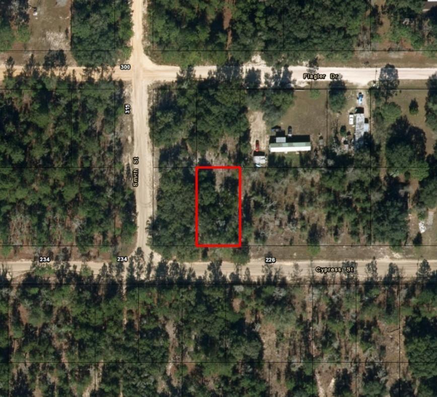 An aerial map view shows a rectangular plot of land highlighted in red — 0 Cypress Street, FL 32148, FL