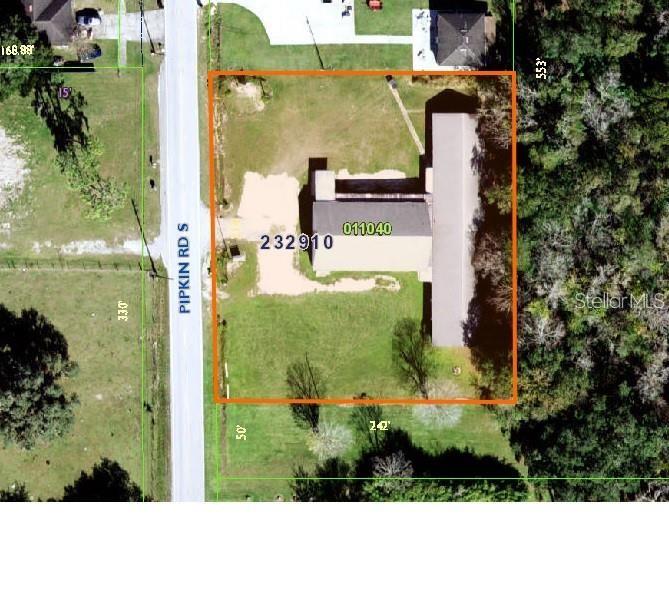 This is an aerial map showing a rectangular property lot with a building and driveway — 4626 S PIPKIN ROAD, LAKELAND, FL