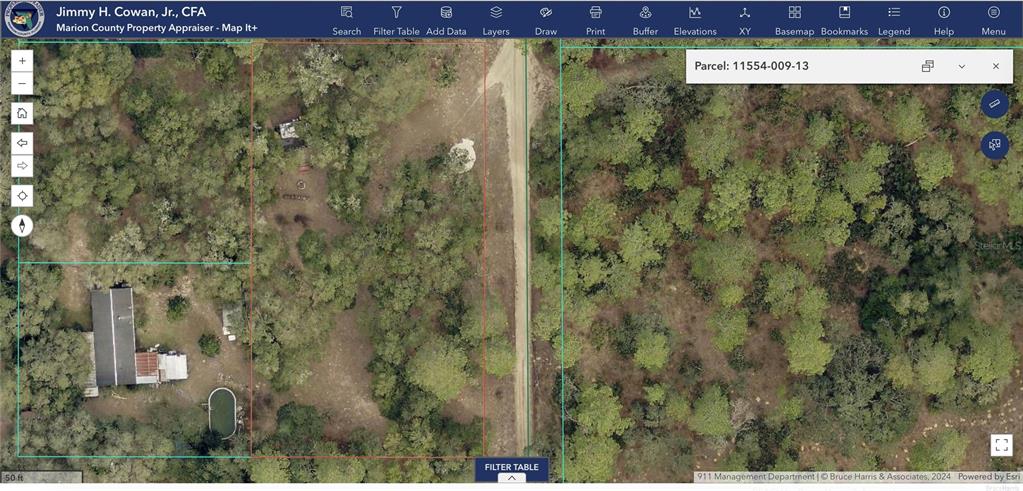 This is a satellite map view showing property parcel boundaries, a house, and a pool — NE 240TH AVENUE, SALT SPRINGS, FL