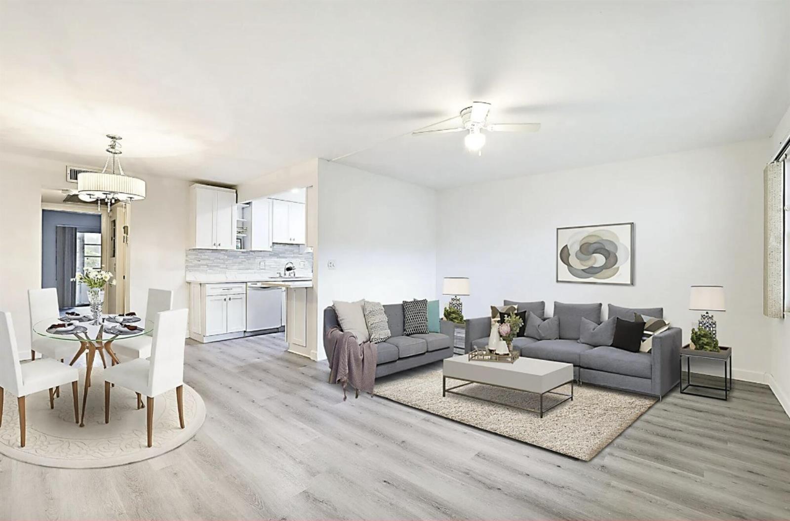 This is a digitally staged rendering of an open-concept living and dining room area — 1038 Cambridge, Deerfield Beach FL 33442, DEERFIELD BEACH, FL