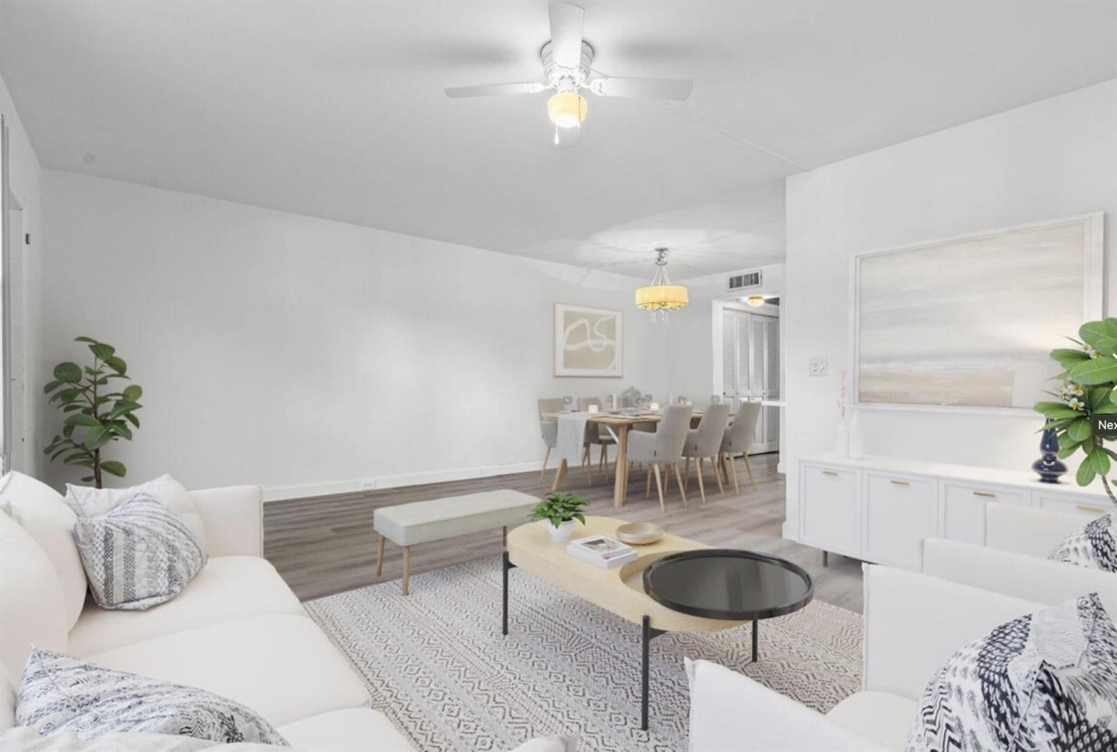 This is a digital rendering of an open-concept living and dining room with wood flooring — 1038 Cambridge, Deerfield Beach FL 33442, DEERFIELD BEACH, FL