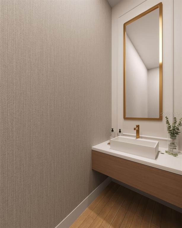 This rendering shows a modern powder room with a floating vanity, vessel sink, and mirror — 642 MEDORA WAY, WINTER GARDEN, FL