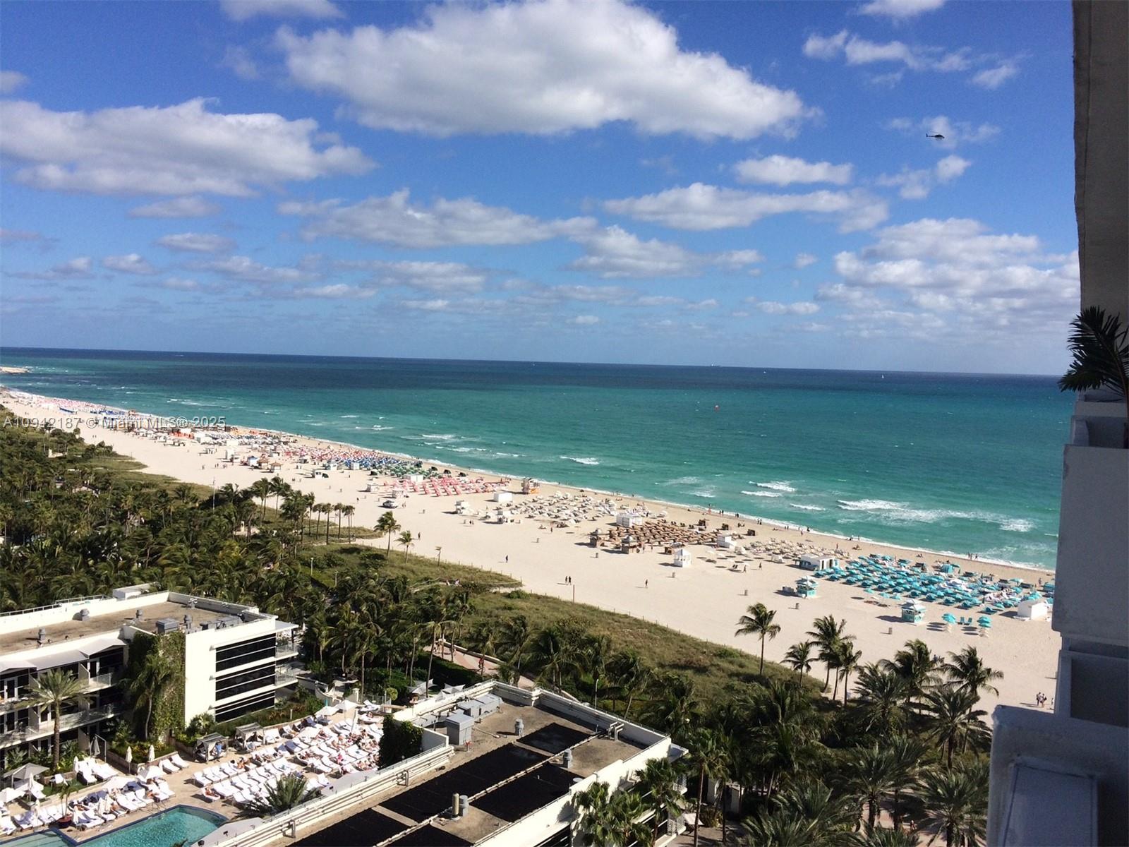 An elevated view of a sandy beach with turquoise water and palm trees — 100 Lincoln Rd # 1637, Miami Beach FL 33139, MIAMI BEACH, FL