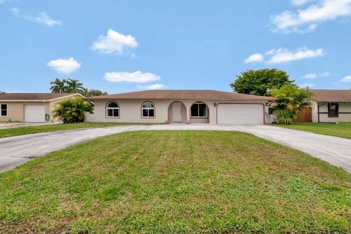 335 Sandpiper Avenue, Royal Palm Beach FL 33411