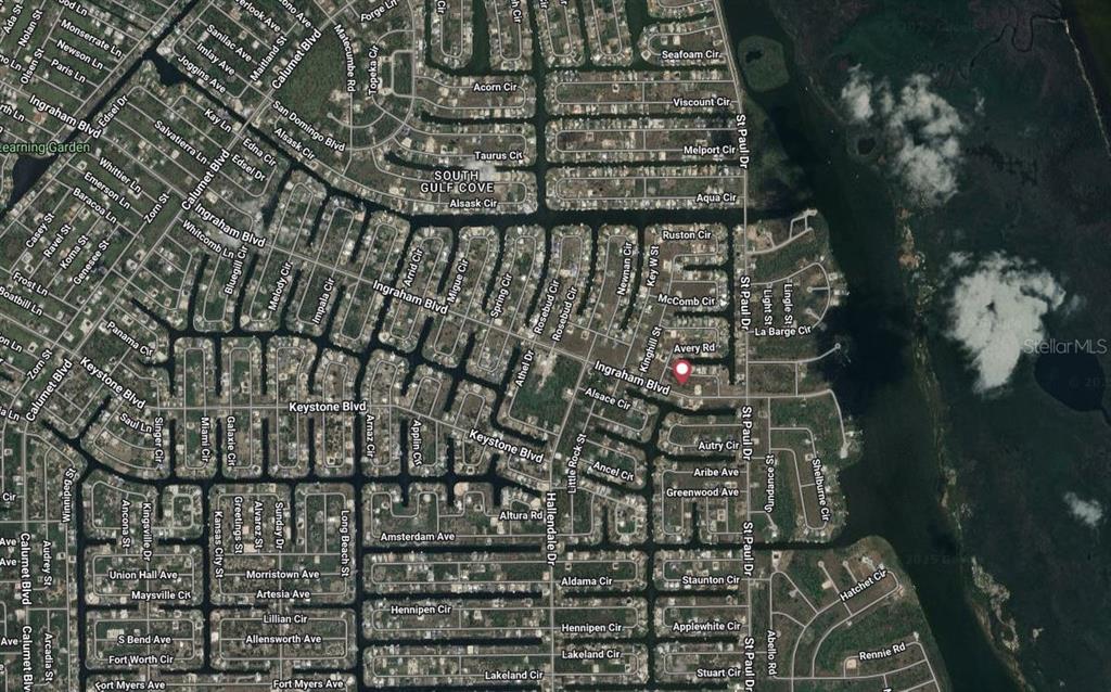 This is an aerial map view of a residential neighborhood with streets and houses — 15068 INGRAHAM BOULEVARD, PORT CHARLOTTE, FL
