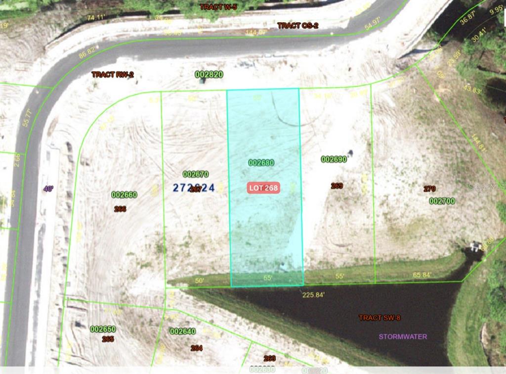 This is a plat map showing a highlighted residential lot adjacent to a stormwater pond — 1237 BUTTERFLY ORCHID ROAD, DAVENPORT, FL