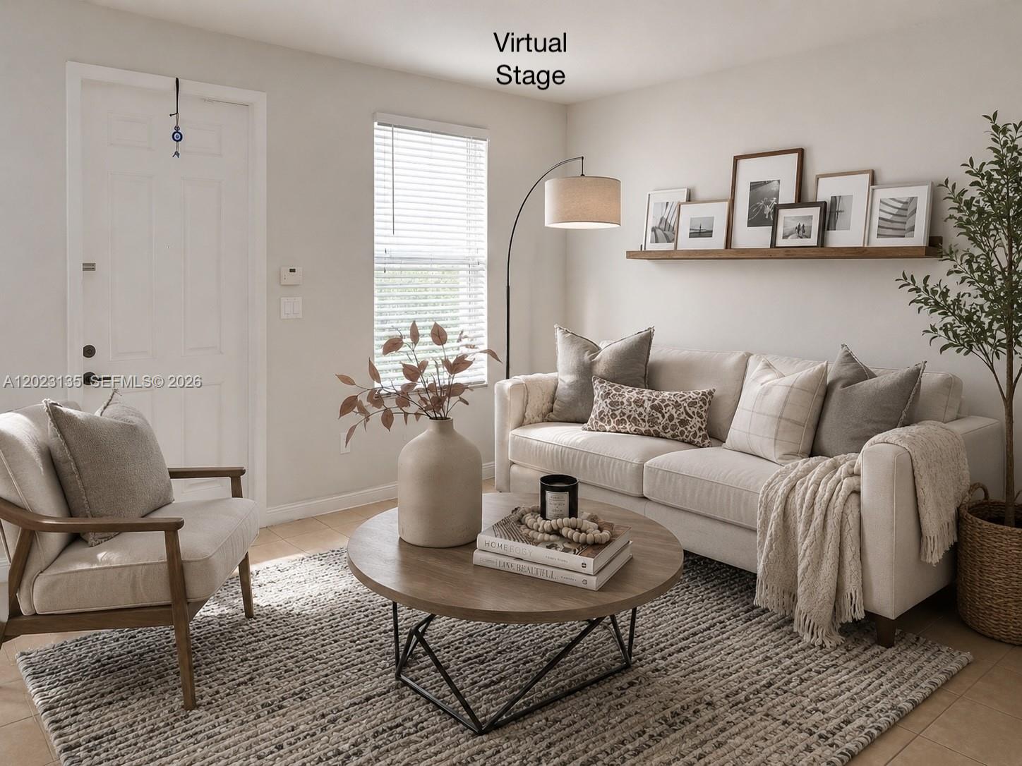 A virtually staged living room features a sofa, armchair, round coffee table, and wall shelf — 11837 SW 27th St, Miramar FL 33025, MIRAMAR, FL