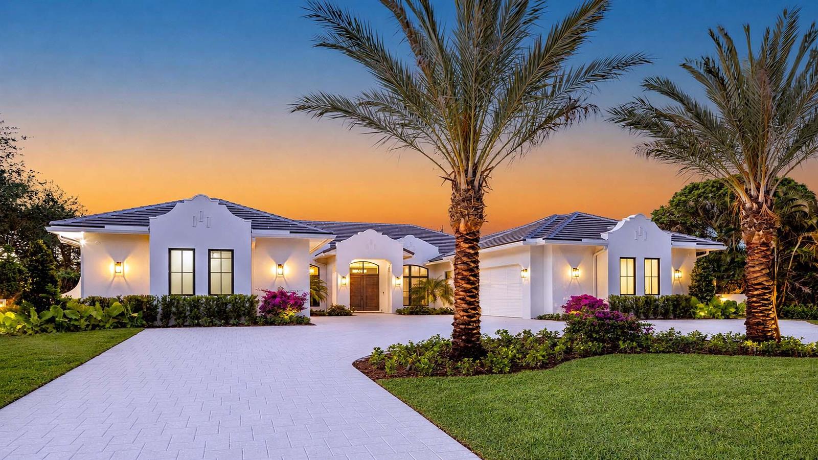 A single-story white house with a tiled roof and palm trees at sunset — 2775 Ave Au Soleil, Gulf Stream FL 33483, GULF STREAM, FL