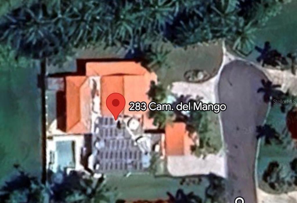This is an aerial satellite map view of a residential property and its surrounding grounds — 283 CAMINO DEL MANGO, GURABO, PR