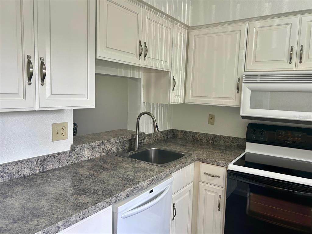 1701 PINEHURST ROAD UNIT 18C, DUNEDIN, FL — photo 2 of 17