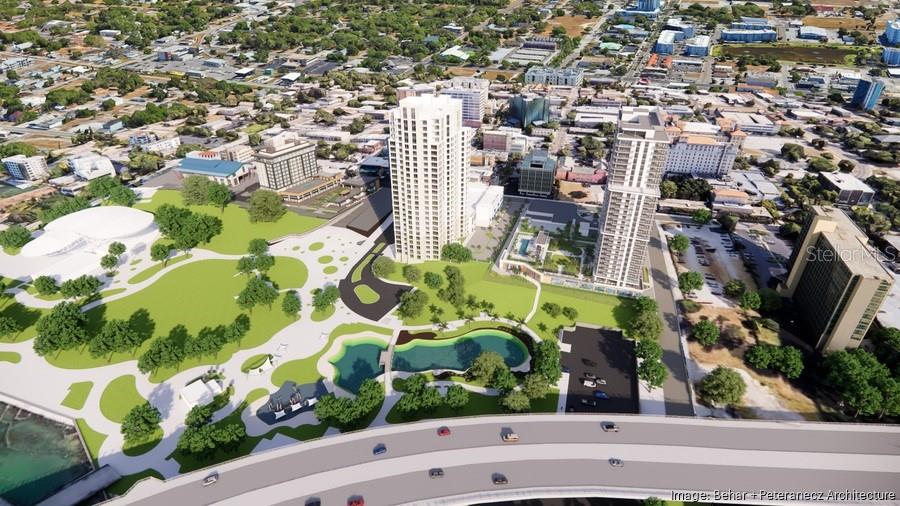 This architectural rendering shows two high-rise buildings situated next to a park and pond — 331 CLEVELAND ST UNIT #301, CLEARWATER, FL