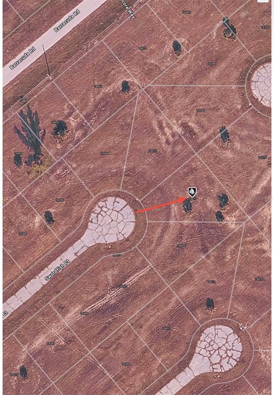 This is an aerial map showing a vacant residential lot marked with a red arrow — 14417 SWORDFISH COURT, PLACIDA, FL