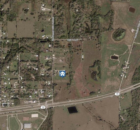 This is an aerial map view showing a residential property located near a highway — 1132 NE 48th Avenue, Okeechobee FL 34972, OKEECHOBEE, FL