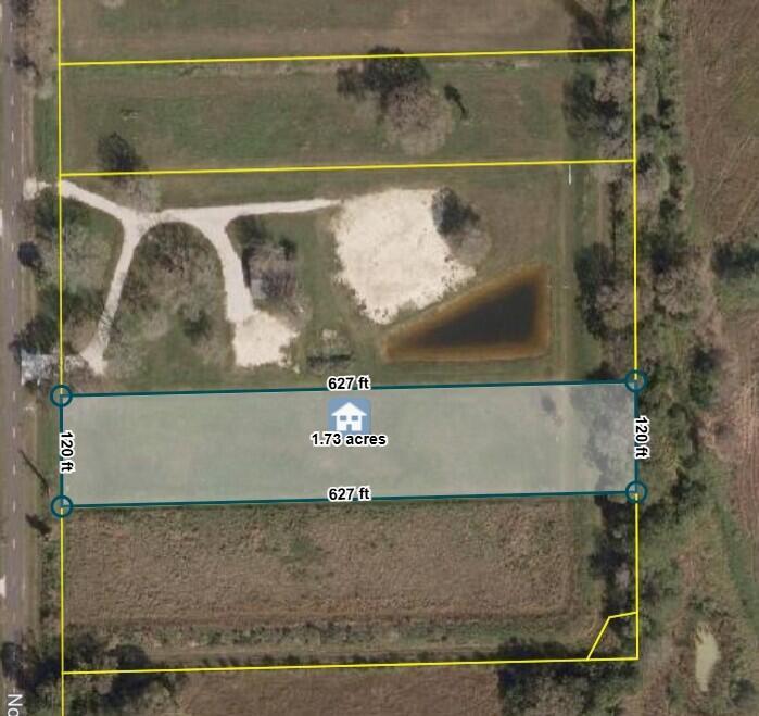 This aerial map shows a rectangular 1.73-acre plot of land highlighted in blue — 1132 NE 48th Avenue, Okeechobee FL 34972, OKEECHOBEE, FL
