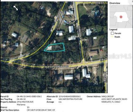 This is an aerial map showing a parcel of land outlined in blue near a road intersection — 2916 MILTON AVENUE, MARIANNA, FL